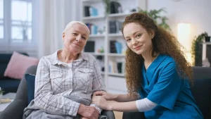 "Compassionate end-of-life care at home with a caregiver providing support to a patient"